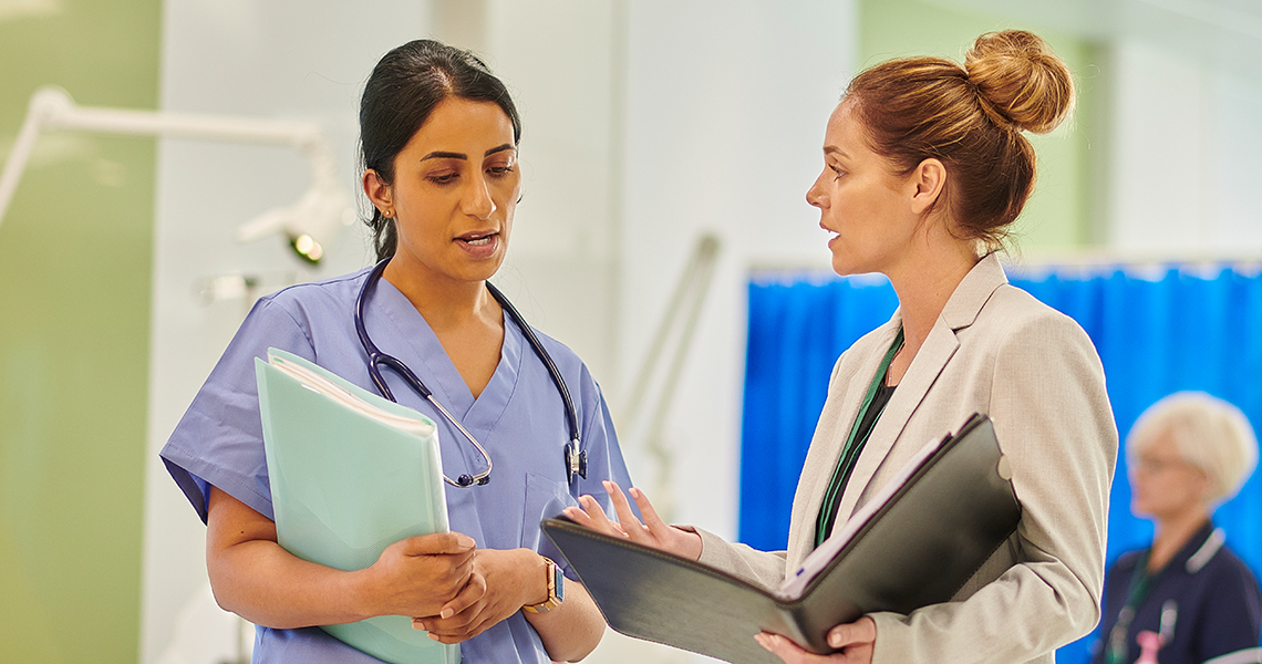 a doctor and an admin talking